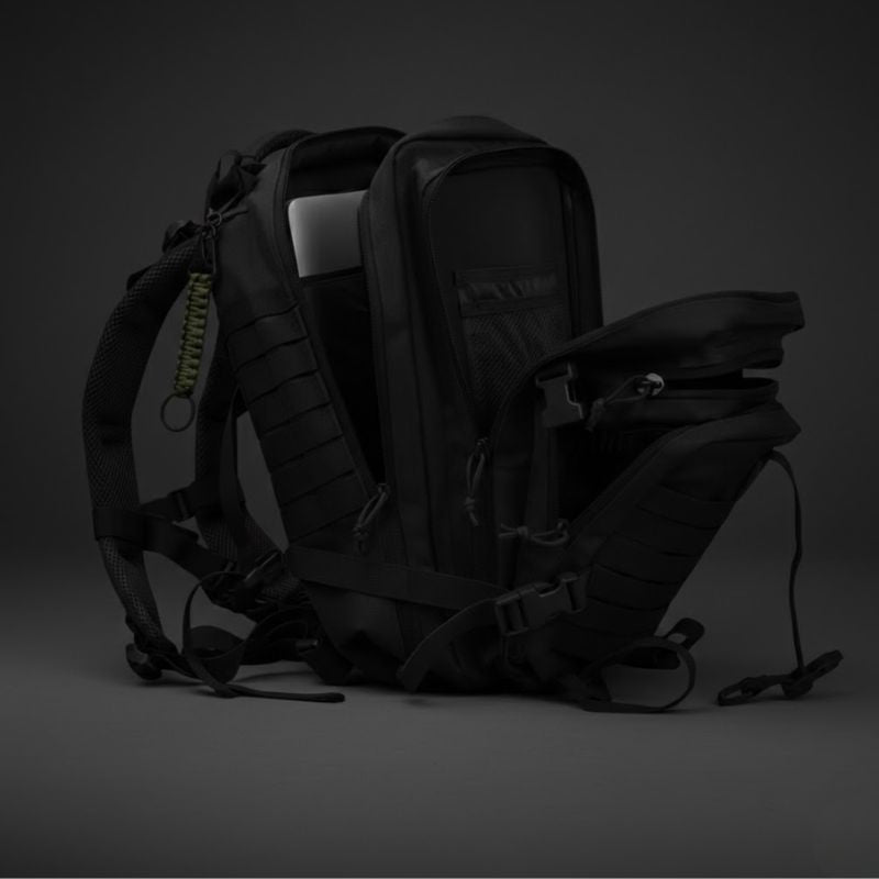 Vue intérieure des multiples compartiments de rangement du sac à dos tactique 38L Militaire Faction.