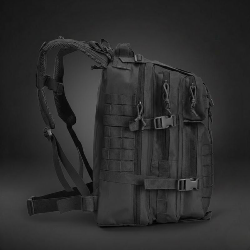 Profil du sac tactique 38L Militaire Faction montrant l'épaisseur ajustable et les fixations latérales.